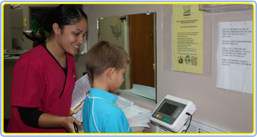 Child being weighed at Dr. Brown’s office